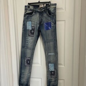 NWOT FWRD MEN'S BLUE PATCHWORK JEANS. SIZE 32x32.